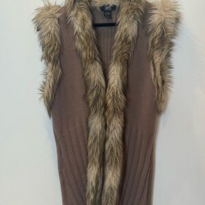 NILS faux vest. Size L. (Perfect for the 10-12)